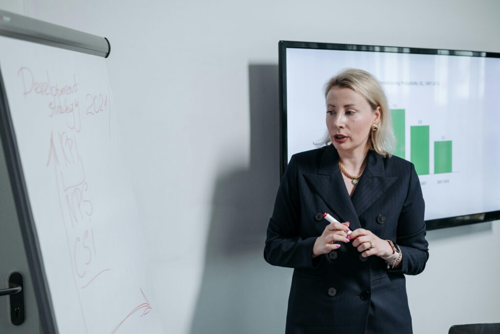 Business development professional explaining growth strategy during a team meeting